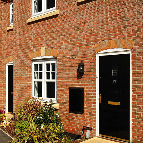 An exterior of a house built using Grosvenor County Mixture bricks