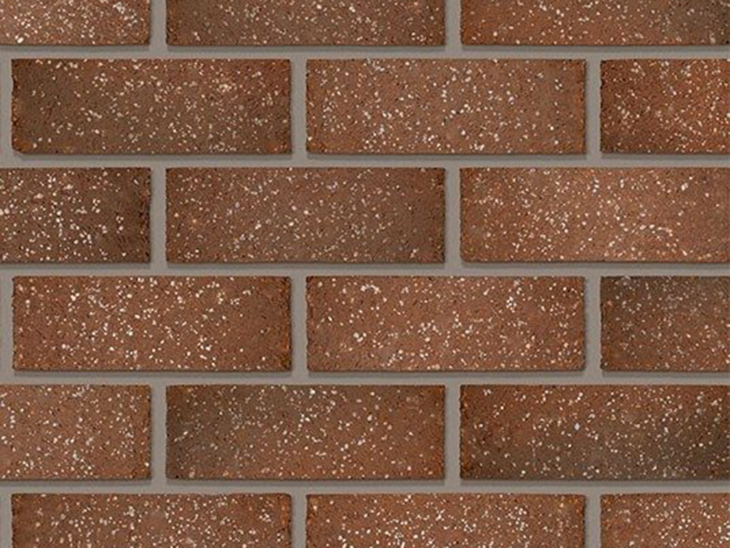 Close up of a wall of Weathered Sandblast bricks