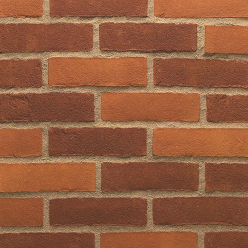 Close up of a wall of EcoBrick Warnham Red Orange Blend bricks