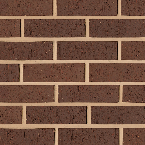 Close up of a wall of Brown Dragwire bricks