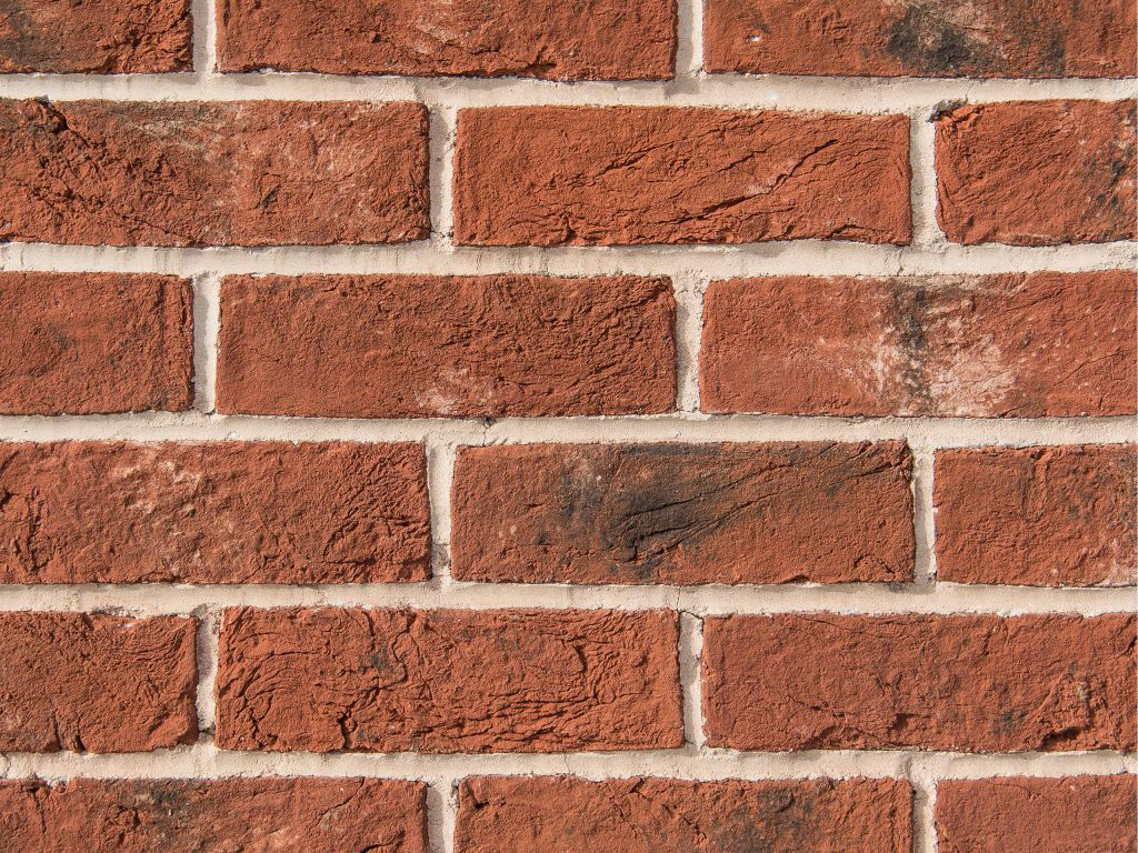 Close up of a wall of Old Dark Blend Handmade bricks