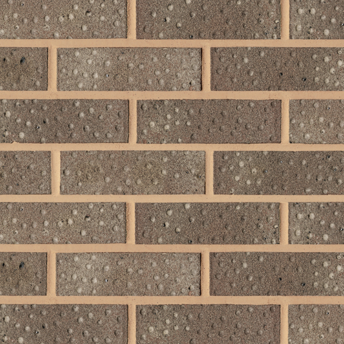 Close up of a wall of Cottesmore Grey bricks