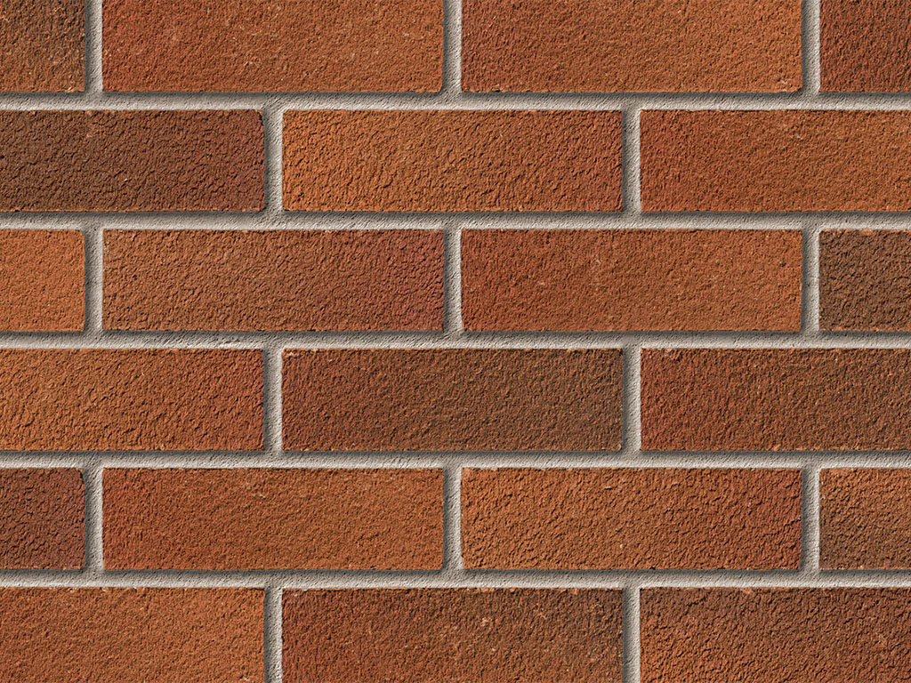 Close up of a wall of Alderley Russet Blend bricks