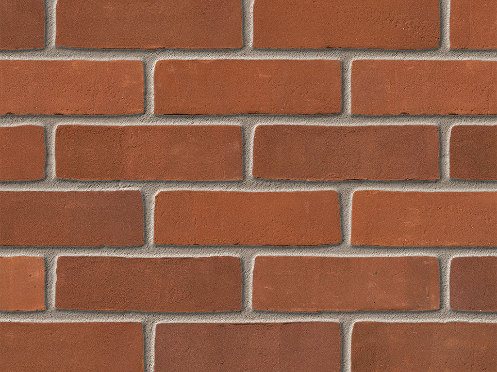 Close up of a wall of Berry Red Stock bricks