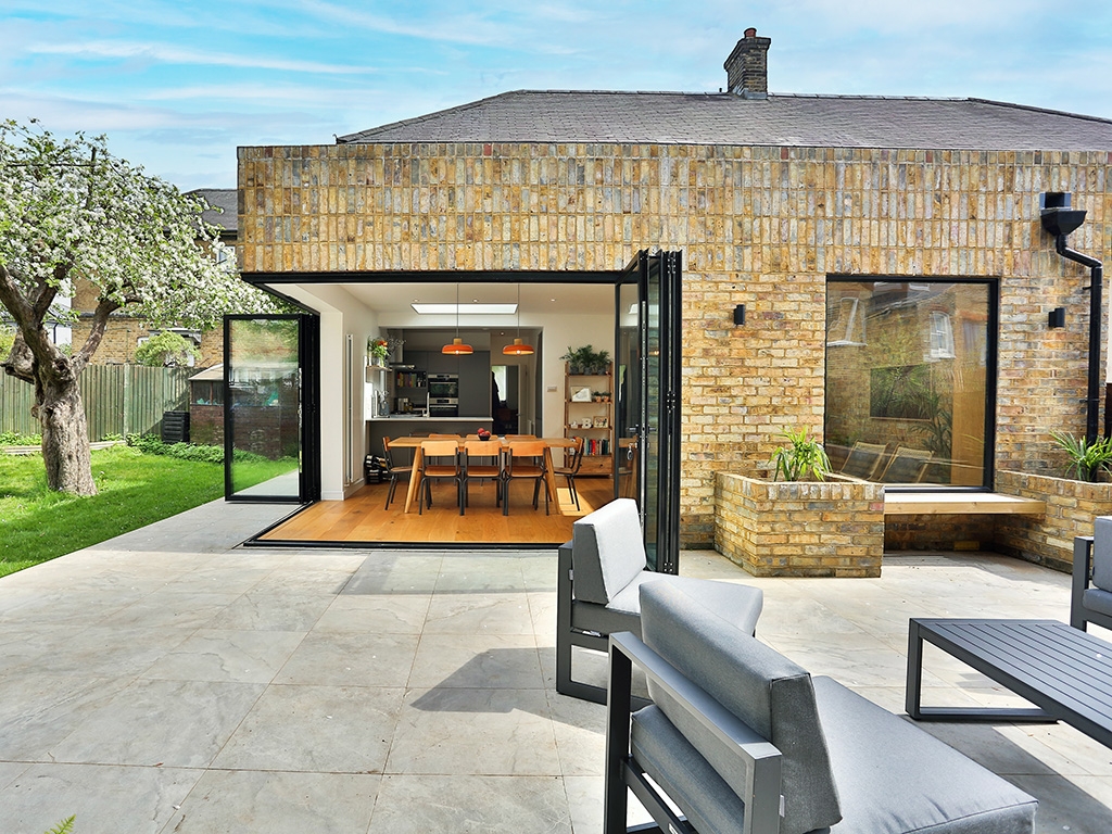 An exterior of a house built using Weathered Original London Stock bricks