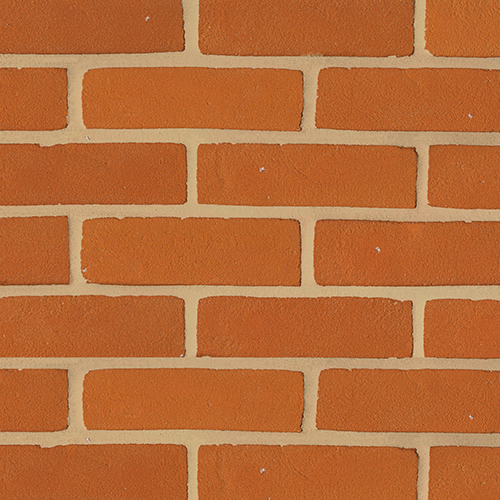 Close up of a wall of Hampshire Stock Orange bricks