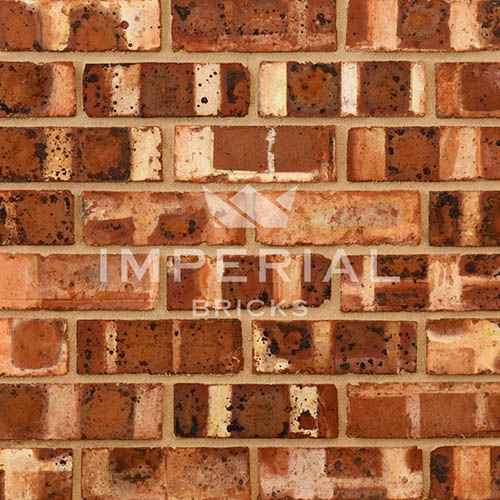 Close up of a wall of Weathered Scotch Pre War bricks