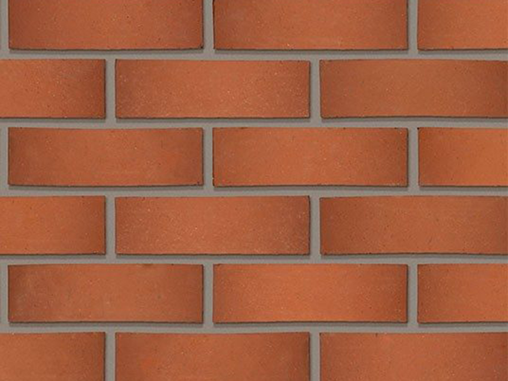 Close up of a wall of Staffordshire Smooth Red bricks