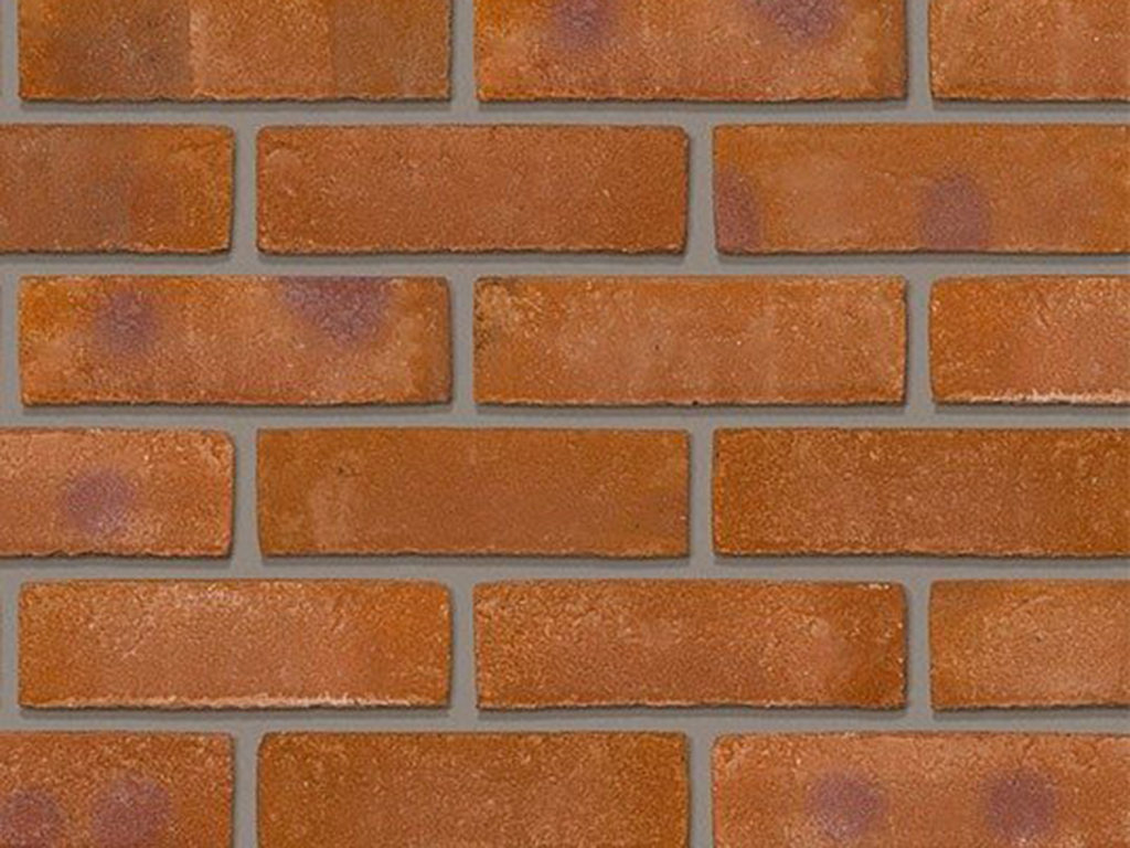 Close up of a wall of Durham Red Multi Stock bricks