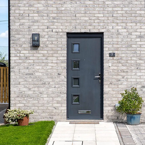 A front door on a house built using Lewis Antique bricks