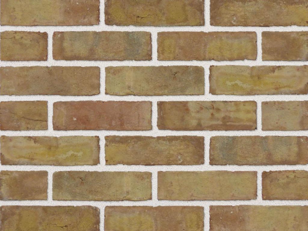 Close up of a wall of Rustic Yellow bricks