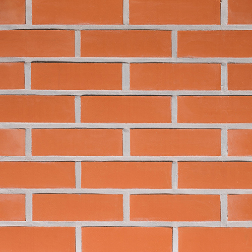 Close up of a wall of Winchester Red Smooth 73mm bricks