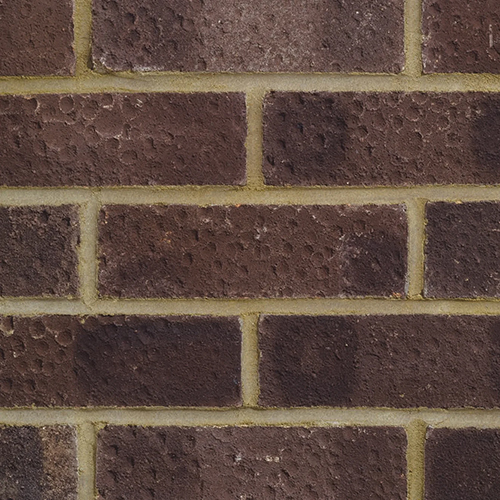 Close up of a wall of Brindle London bricks