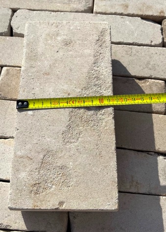 View of a single brick in reclaimed white linear