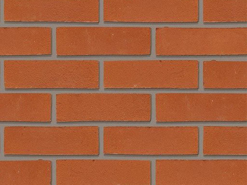Close up of a wall of Dorchester Red Stock bricks