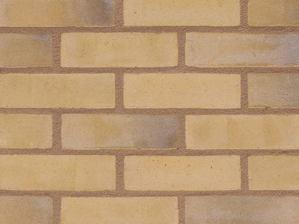 Close up of a wall of Stamford Weathered Buff bricks