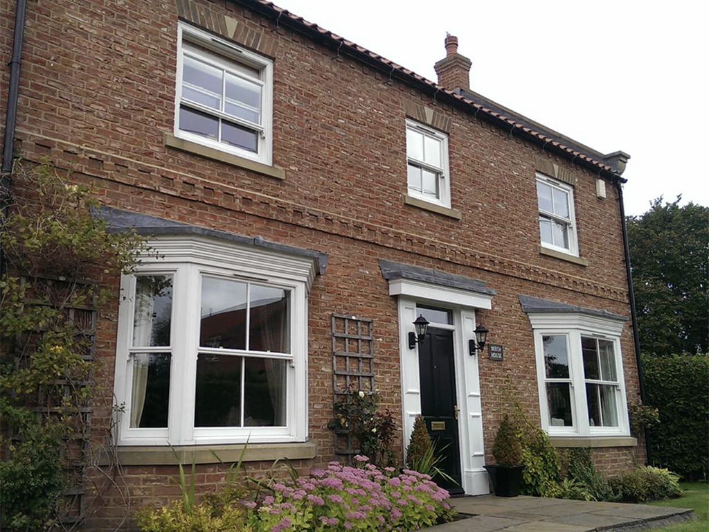 An exterior of a house built using Hambleton bricks