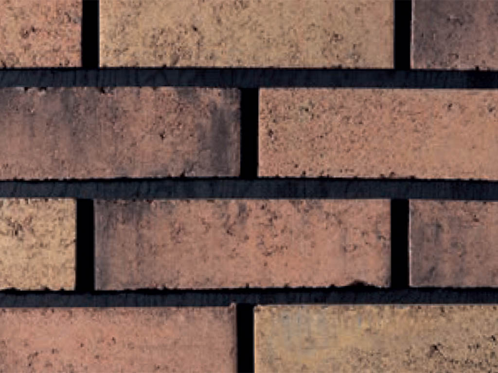 Close up of a wall of Kensington Buff bricks