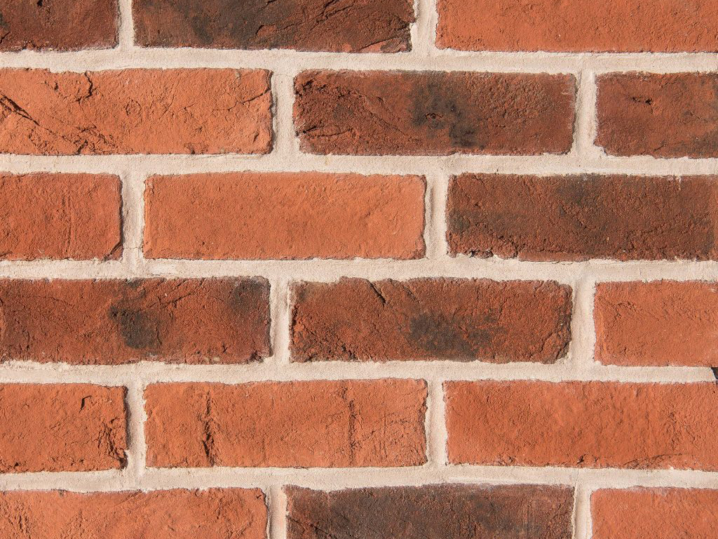 Close up of a wall of Melford Blend Handmade bricks