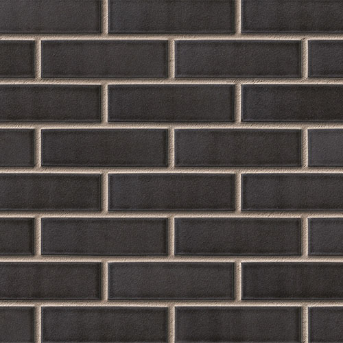 Close up of a wall of Brunel Blue bricks