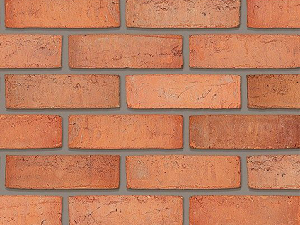 A wall of Mellowed Red Sovereign Stock bricks