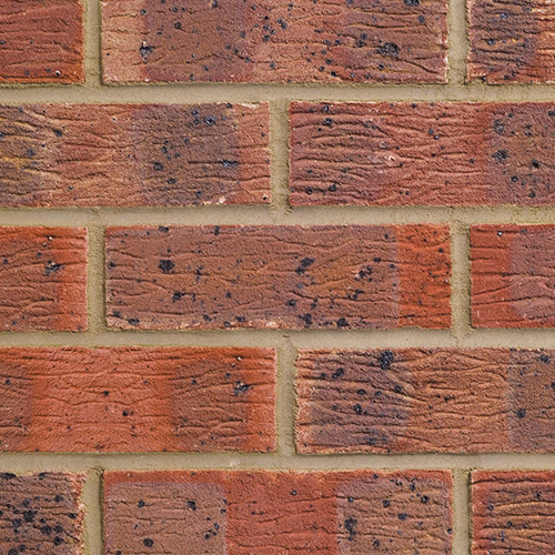 Close up of a wall of Claydon Red Multi London bricks