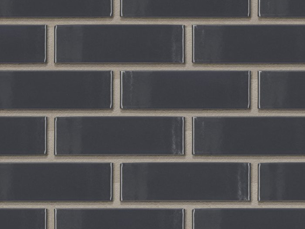 Close up of a wall of Oslo Dark Grey Glazed bricks