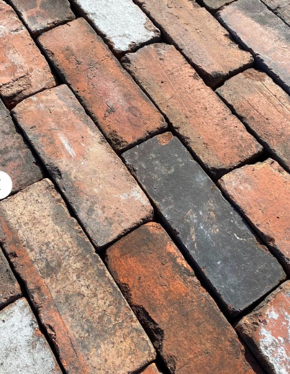 Close up view of diagonal lay out of industrial blend pressed brick