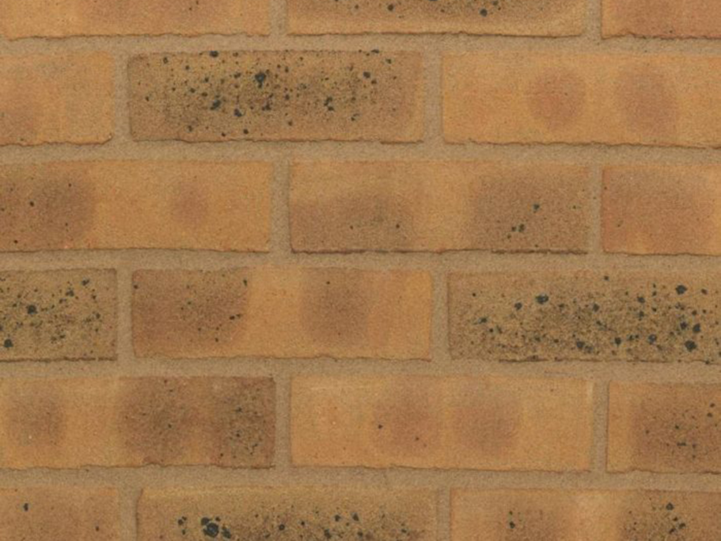 Close up of a wall of Brookhurst Yellow Multi  bricks