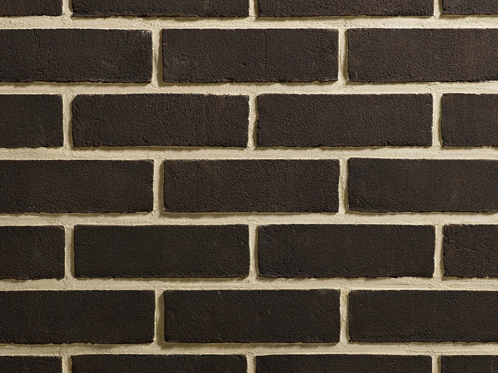 Close up of a wall of Black Stock bricks