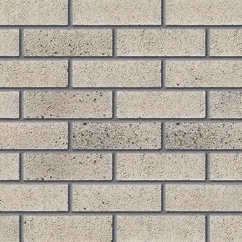 Close up of a wall of Pearl Spar bricks