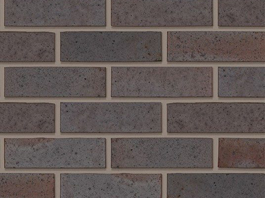 Close up of a wall of Telford Brindle bricks