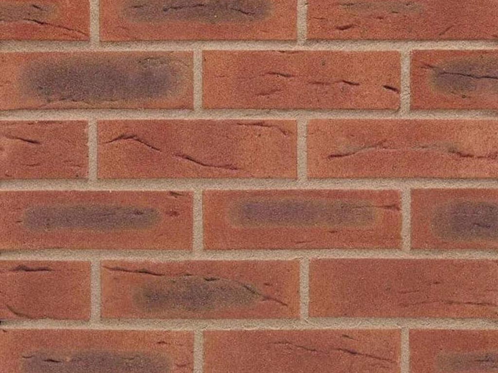 Close up of a wall of Bisque Red Multi bricks