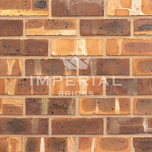 Close up of a wall of Weathered Cheshire Pre War bricks