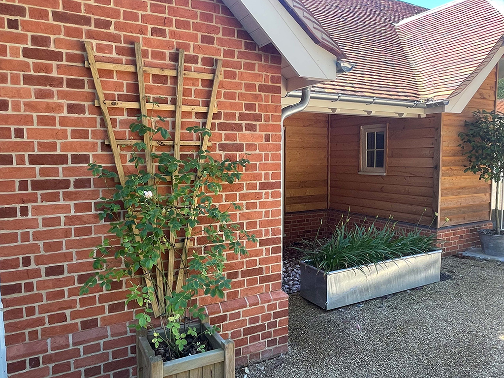 Rear view of an Orange Village Handmade brick property