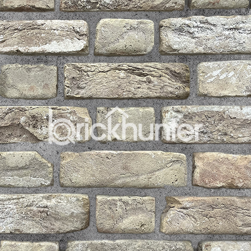 Close up of a wall of St Ives Cream Rustica bricks