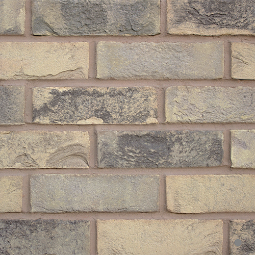Close up of a wall of Milton Hall Dark Blend bricks
