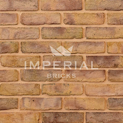Close up of a wall of Windsor Weathered Yellow Multi Stock bricks