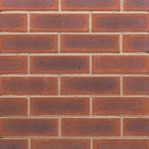 Close up of a wall of Titian bricks