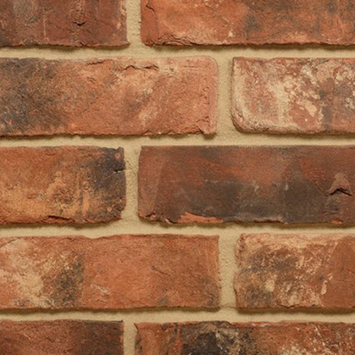 Close up of a wall of Olde Reclamation Clamp bricks