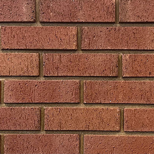Close up of a wall of Southgate Red Multi bricks