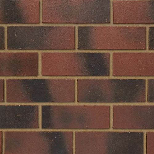Close up of a wall of Ruskin Red 73mm bricks