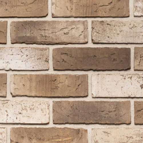 Close up of a wall of El Tigre Waterstruck bricks