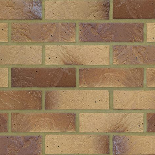 Close up of a wall of Yellow Multi Textured bricks
