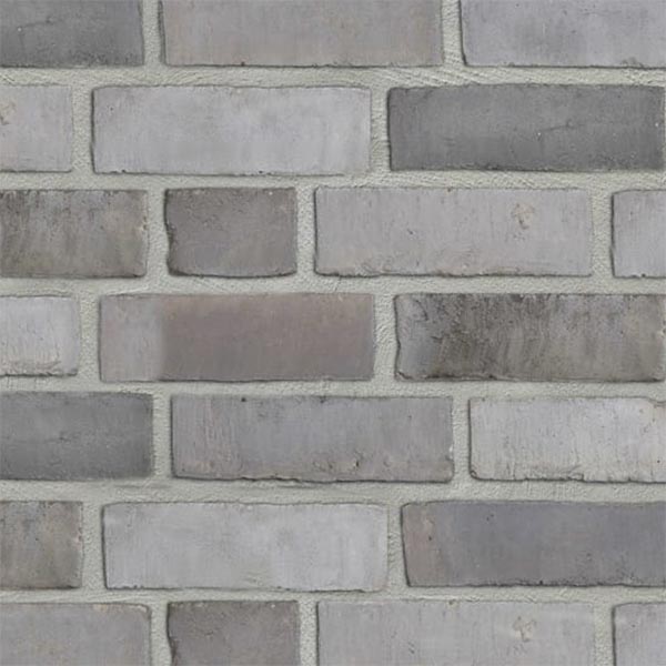 Close up of a wall of Smoked Grey Waterstruck bricks