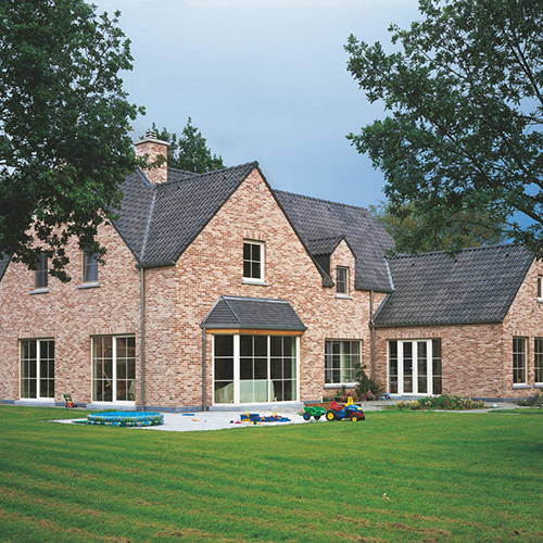 An exterior of a house built using Venus Rustica bricks