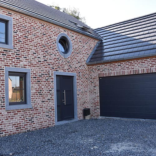 A rear exterior of a house built using Multi Red Rustica bricks