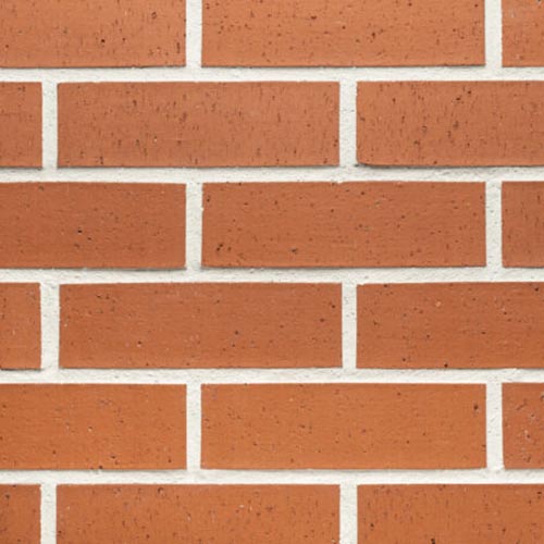 Close up of a wall of Morley Red Dragfaced bricks
