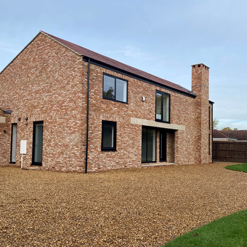 An exterior of a house built using Kempton Rustica bricks