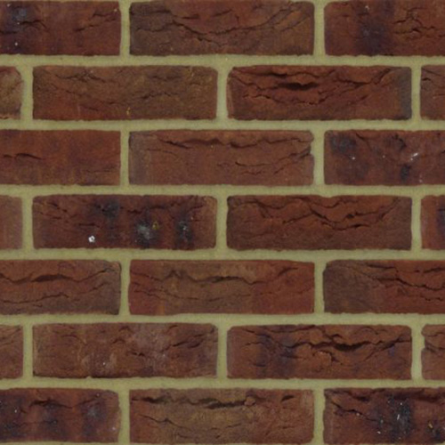 Close up of a wall of Victory Red Multi bricks